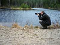 Jocke med fotograferingsapparaten